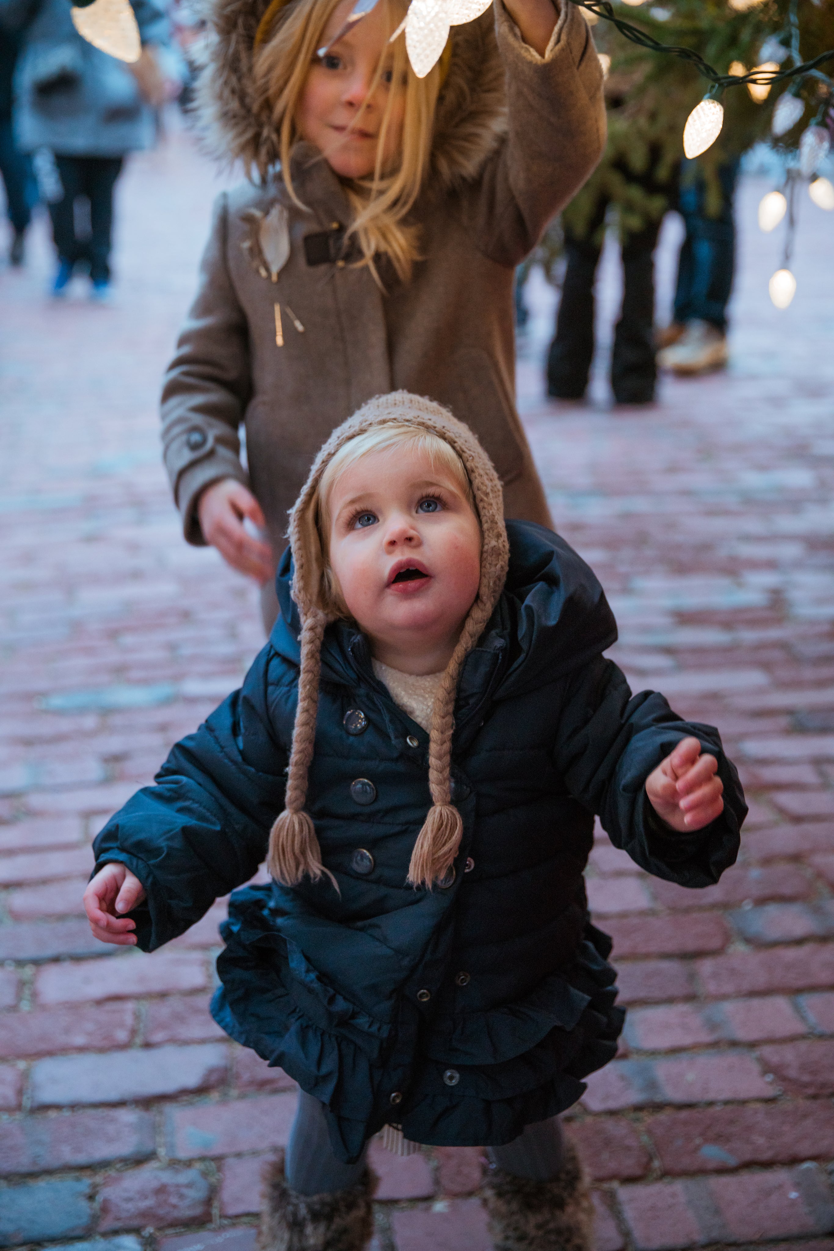 files/siblings-play-in-festive-decorations.jpg